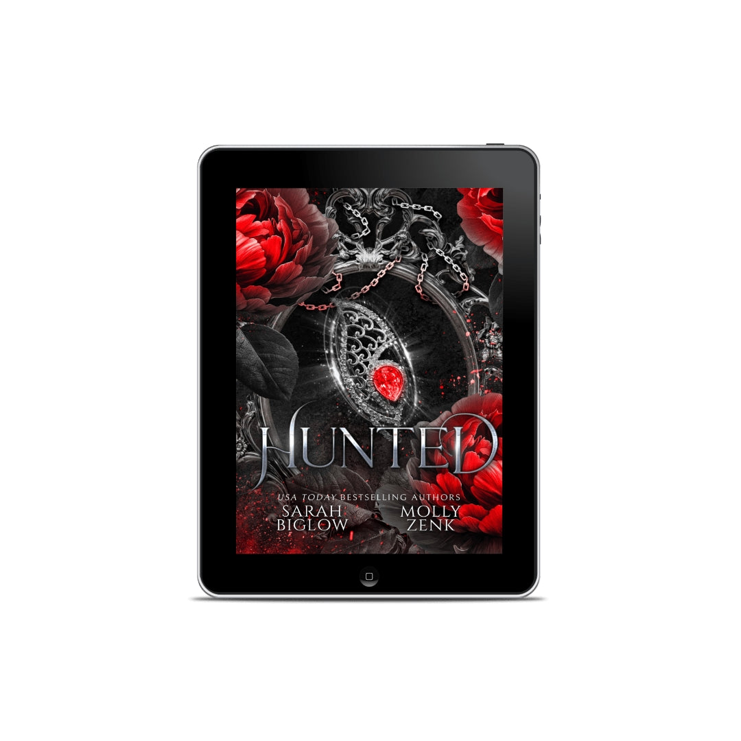 Hunted special edition ebook cover featuring a silver locket with a red gemstone, paranormal romance