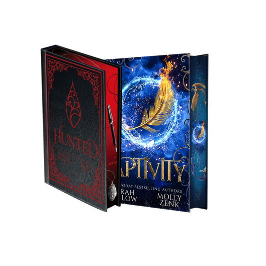 Harddocver of Hunted and Captivity with fantasy elements and decorative sprayed edges