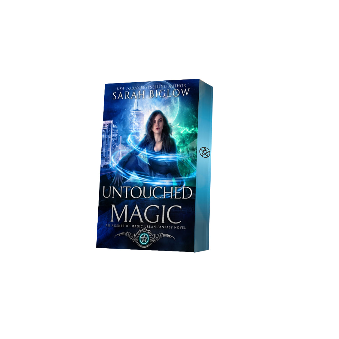Paperback of Untouched Magic with decorative edges by Sarah Biglow on white background
